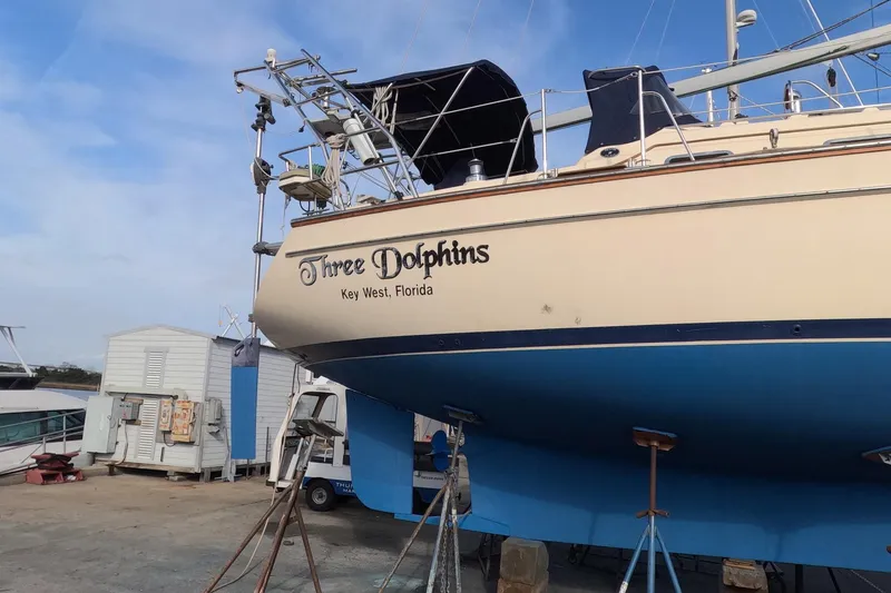 Slide: The Image of Island Packet 370 sailboat named "Three Dolphins" in dry dock, Key West, Florida, 2005 model. - 37