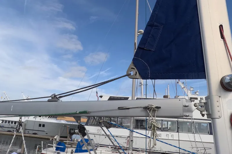 Slide: The Image of Sailboat rigging on a 2005 Island Packet 370 under a clear blue sky. - 34