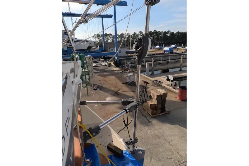 Slide: The Image of 2005 Island Packet 370 sailboat in a shipyard, undergoing maintenance. - 33
