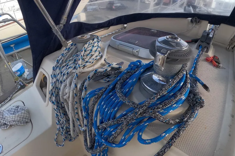 Slide: The Image of Sailboat deck with ropes and winch on a 2005 Island Packet 370. - 20