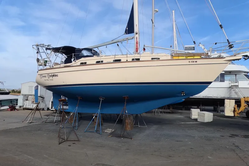 Slide: The Image of 2005 Island Packet 370 sailboat on stands in a boatyard, Key West, Florida. - 1