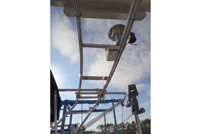Slide: The Image of Stainless steel rigging on a 2005 Island Packet 370 sailboat under a blue sky. - 39