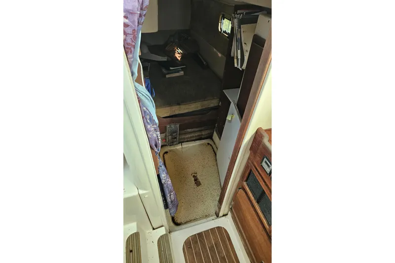 Slide: The Image of Interior cabin of 2005 Gemini MC 105 sailboat, featuring compact living space. - 20