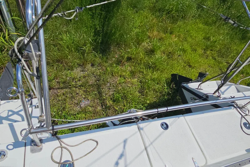 Slide: The Image of Sailboat deck of 2005 Gemini MC 105, surrounded by lush green grass. - 33
