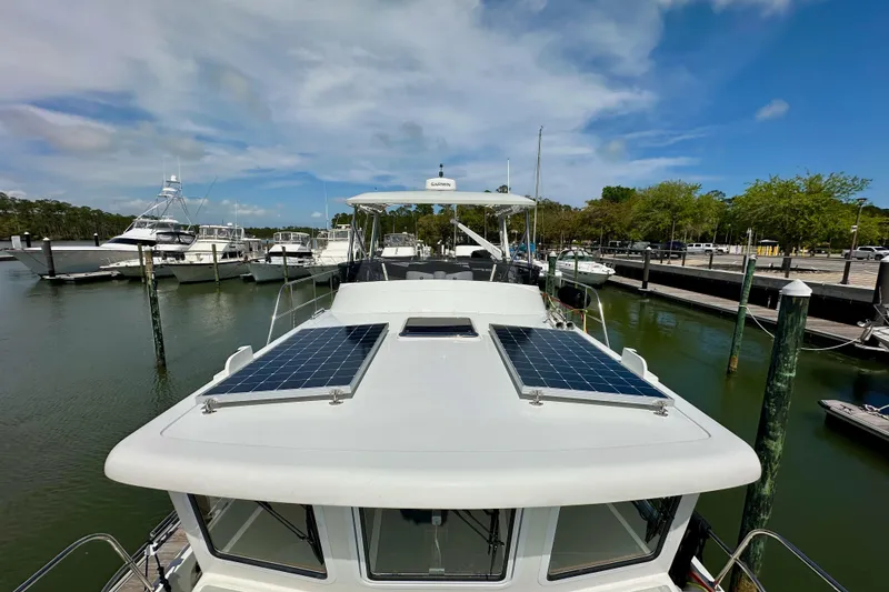 Slide: The Image of 2025 Helmsman Trawlers 43E Pilothouse - Pilothouse Mounted Solar Panels - 16