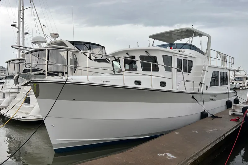 Slide: The Image of 2025 Helmsman Trawlers 43E Pilothouse port - 18