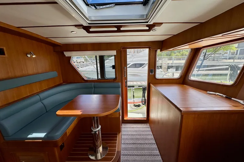 Slide: The Image of 2025 Helmsman Trawlers 43E Pilothouse - Pilothouse Companion Seating - 7
