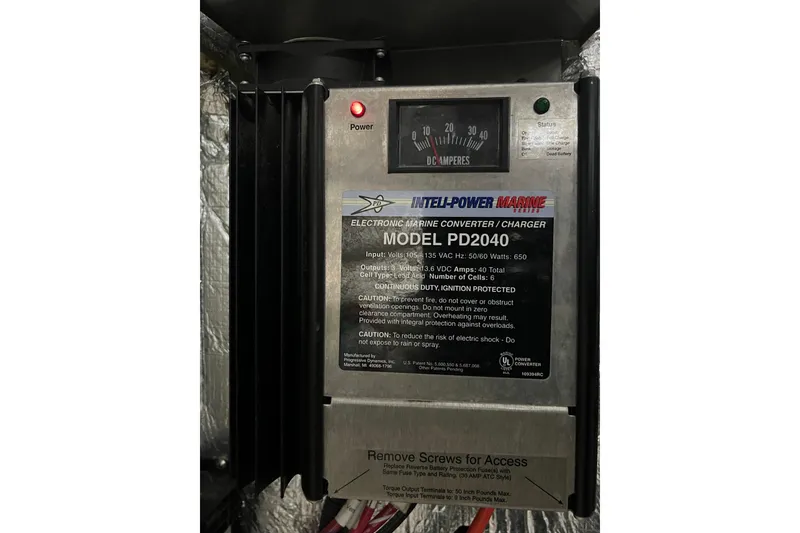 Slide: The Image of 2008 Rinker 400 Express Cruiser marine converter charger, Model PD2040, with DC amp meter. - 23