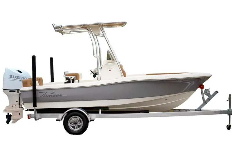 Slide: The Image of 2026 Pioneer 180 Sportfish boat with Yamaha engine, covered and on a trailer. - 2