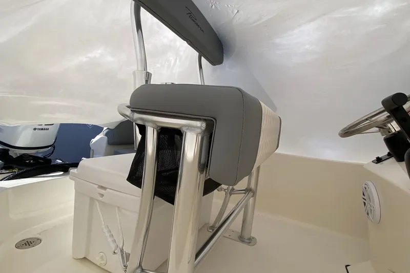 Slide: The Image of 2026 Pioneer 180 Sportfish boat interior with Yamaha engine and seating. - 7
