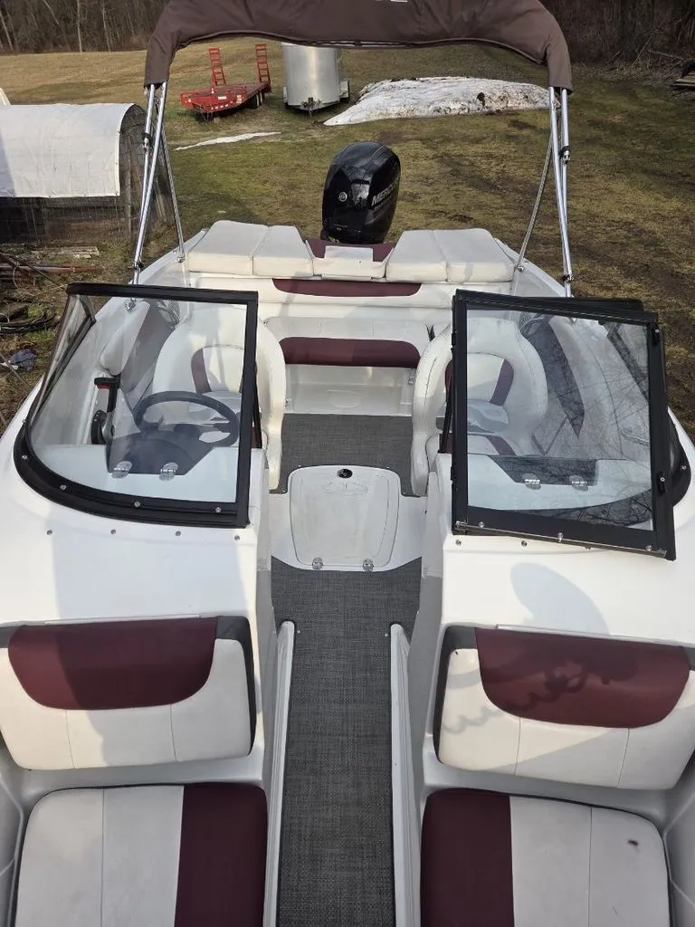 Slide: The Image of Interior view of a 2019 Tahoe 550 TF boat with open cockpit. - 6