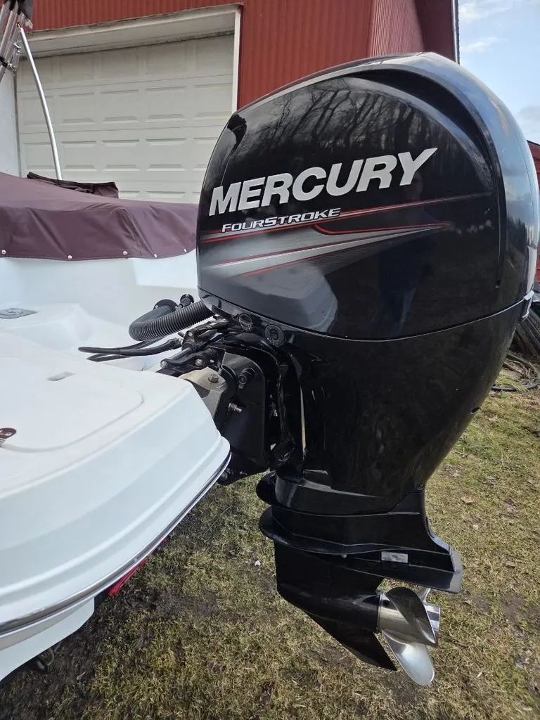 Slide: The Image of 2019 Tahoe 550 TF with Mercury FourStroke outboard motor. - 7