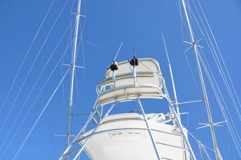 Slide: The Image of 2006 Custom Carolina Heritage Express boat tower against clear blue sky. - 20