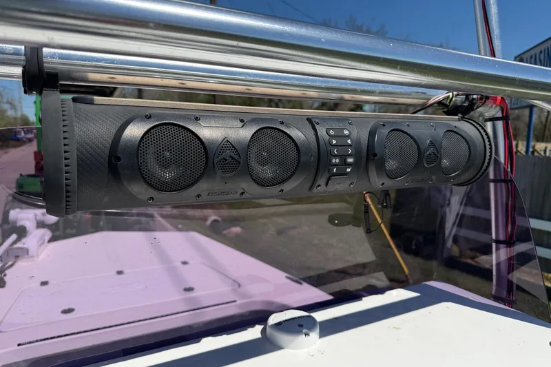 Slide: The Image of 2022 Majek 18 M2 boat with mounted audio system, featuring multiple speakers. - 19