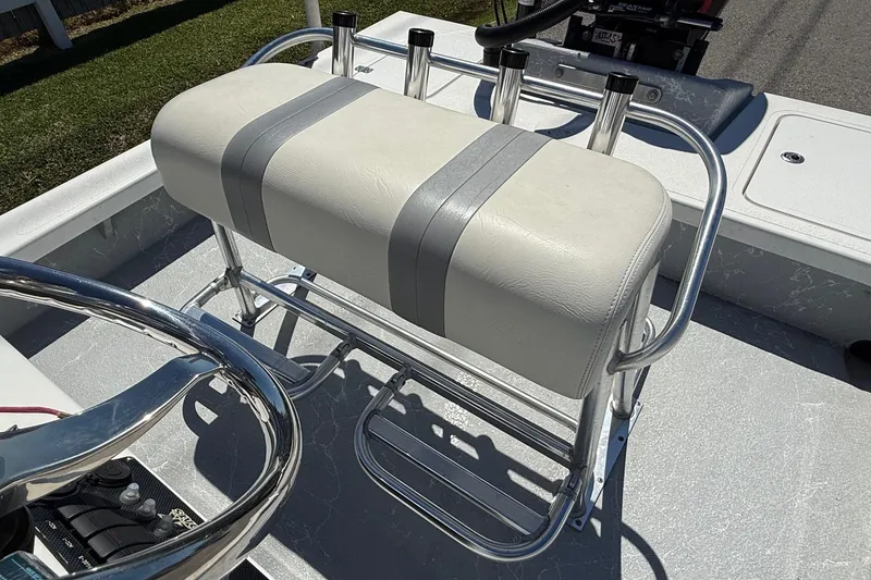 Slide: The Image of 2022 Majek 18 M2 boat with cushioned seating and stainless steel frame. - 9