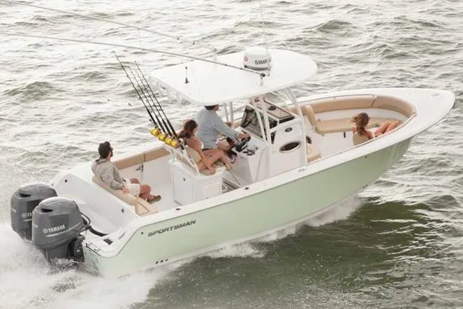 Slide: The Image of Manufacturer Provided Image: 2017 Sportsman Heritage 251 Center Console boat cruising with passengers on board. - 10