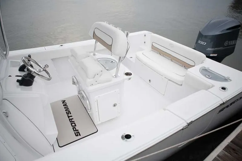 Slide: The Image of Manufacturer Provided Image: 2017 Sportsman Heritage 251 Center Console boat interior with seating and Yamaha 300 engine. - 13