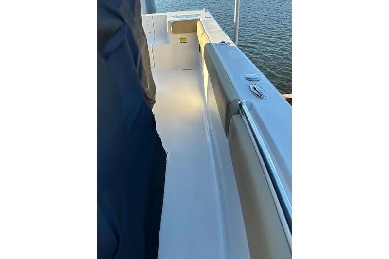 Slide: The Image of 2017 Sportsman Heritage 251 Center Console boat deck with water view. - 5