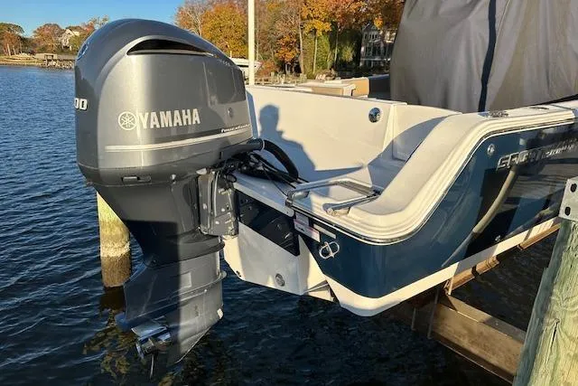 Slide: The Image of 2017 Sportsman Heritage 251 Center Console with Yamaha outboard motor on a sunny day. - 6
