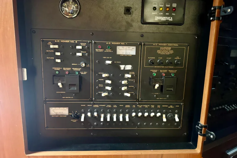 Slide: The Image of Electrical control panel on a 2001 Cruisers Yachts 3470 Express boat. - 15