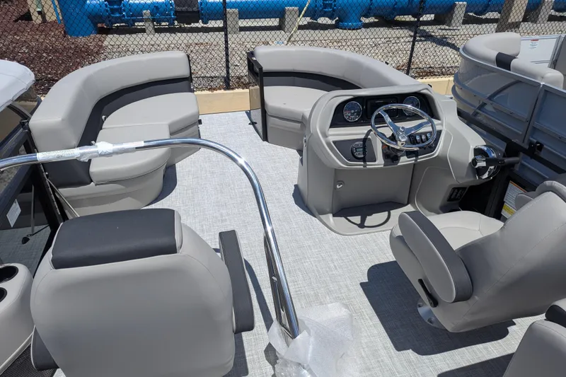 Slide: The Image of Steering console of 2026 Dockside 22DQ2.75 boat with gauges and controls. - 3