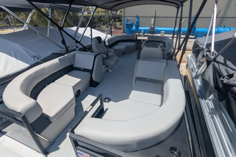 Slide: The Image of Spacious interior of 2026 Dockside 22DQ2.75 pontoon boat with comfortable seating. - 9