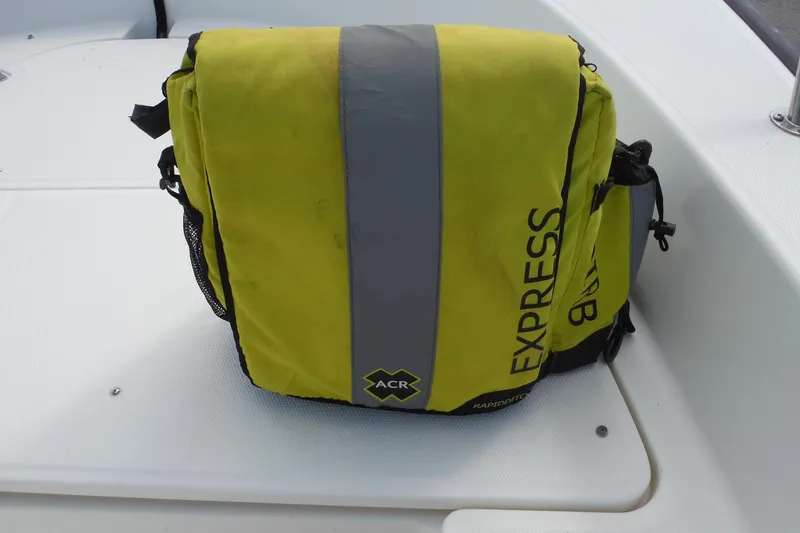 Slide: The Image of Yellow ACR Express bag on 2015 Boston Whaler 210 Montauk boat deck. - 36