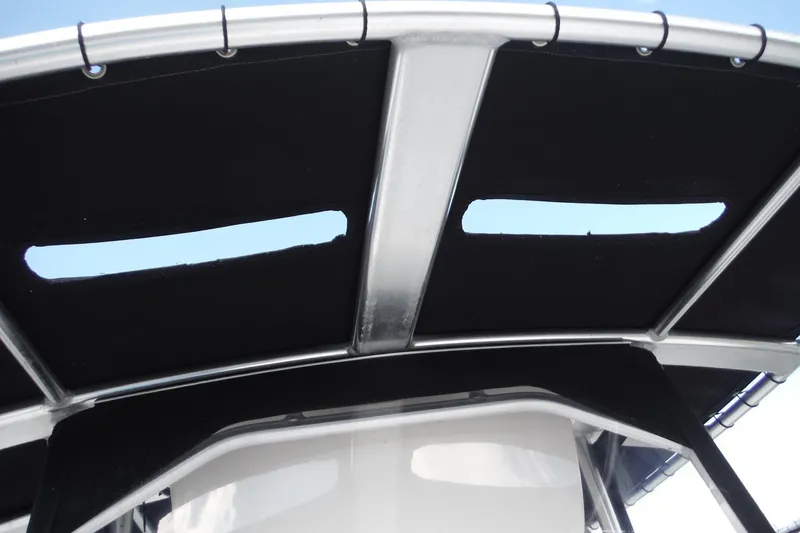 Slide: The Image of 2015 Boston Whaler 210 Montauk boat canopy with metal frame and cutouts. - 37