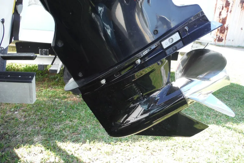 Slide: The Image of Close-up of a 2015 Boston Whaler 210 Montauk boat motor and propeller. - 40