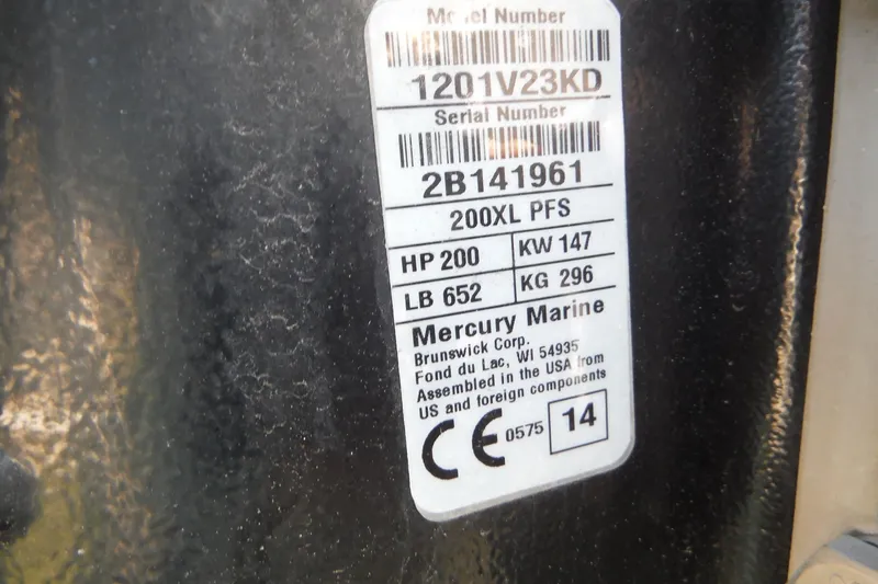 Slide: The Image of Label on a 2015 Boston Whaler 210 Montauk, featuring Mercury Marine engine specifications. - 41