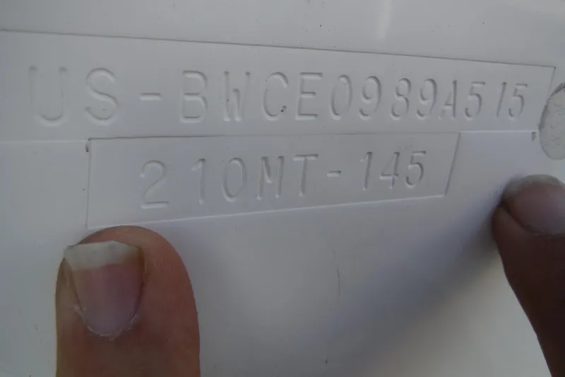 Slide: The Image of Hull identification number on a 2015 Boston Whaler 210 Montauk boat. - 42