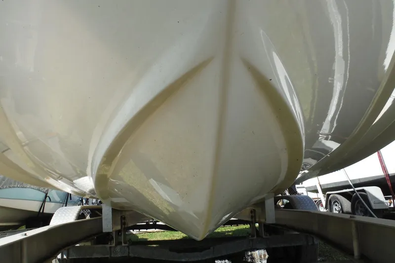 Slide: The Image of 2015 Boston Whaler 210 Montauk boat hull on trailer, close-up view. - 47