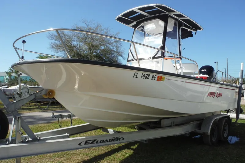 Slide: The Image of 2015 Boston Whaler 210 Montauk boat on EZ Loader trailer, side view. - 50