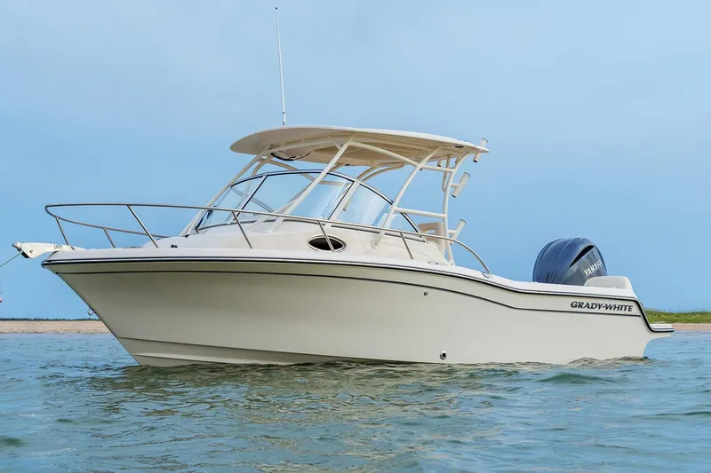 Slide: The Image of Manufacturer Provided Image: 2023 Grady-White Adventure 218 boat on water, side view. - 3
