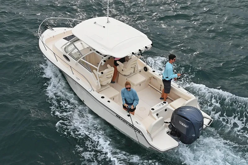 Slide: The Image of Manufacturer Provided Image: 2023 Grady-White Adventure 218 boat on water with two people fishing. - 4