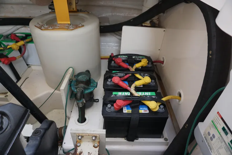 Slide: The Image of Engine compartment of 2007 Tiara Yachts 3900 Sovran with batteries and wiring. - 17