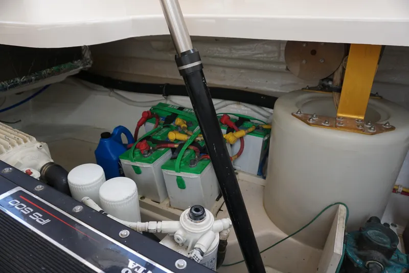Slide: The Image of Engine compartment of 2007 Tiara Yachts 3900 Sovran with batteries and hydraulic components. - 18