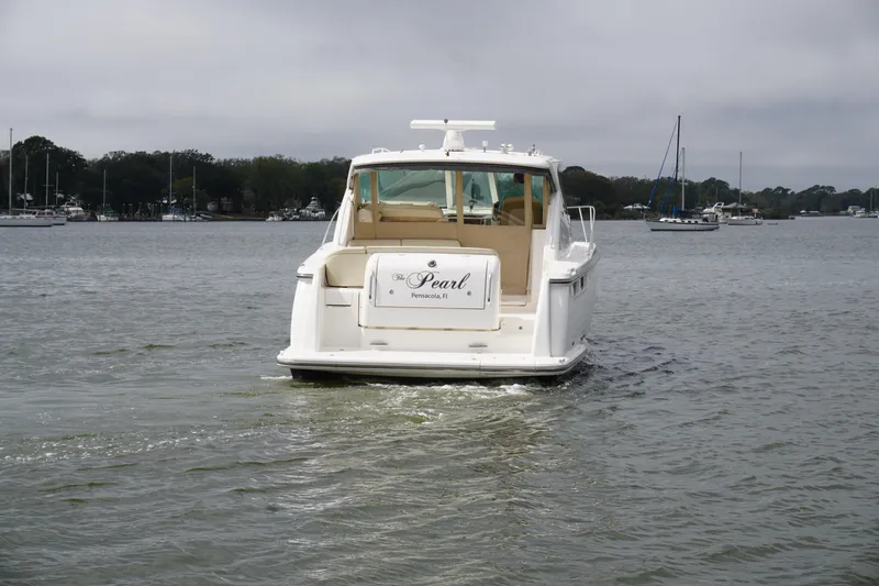 Slide: The Image of 2007 Tiara Yachts 3900 Sovran on water, rear view, overcast sky. - 26