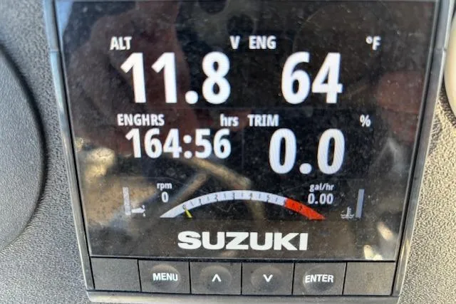 Slide: The Image of Display screen of Suzuki engine on 1984 Mako 221 Center Console boat. - 23