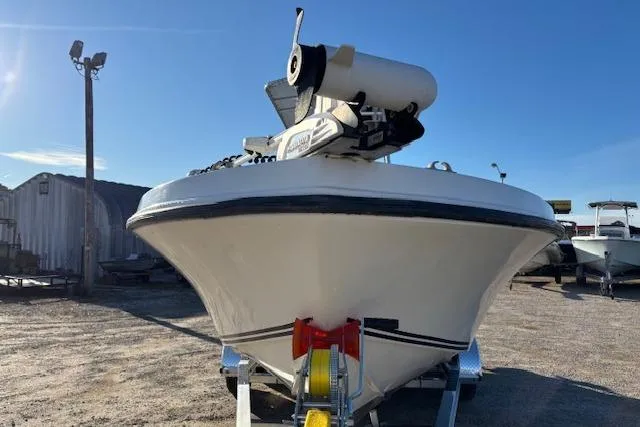 Slide: The Image of 1984 Mako 221 Center Console boat on trailer in outdoor storage area. - 4