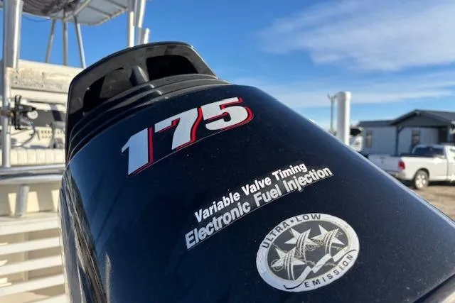 Slide: The Image of Outboard motor with 175 horsepower, featuring variable valve timing and electronic fuel injection. - 5