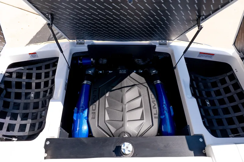 Slide: The Image of 2026 MasterCraft NXT24 engine compartment with Ilmor engine, open hatch view. - 22