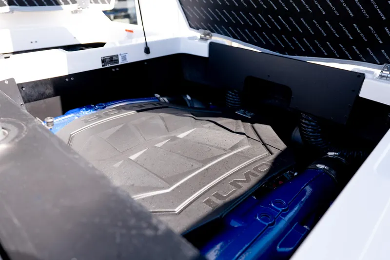Slide: The Image of Engine compartment of 2026 MasterCraft NXT24 boat, featuring Ilmor engine components. - 24