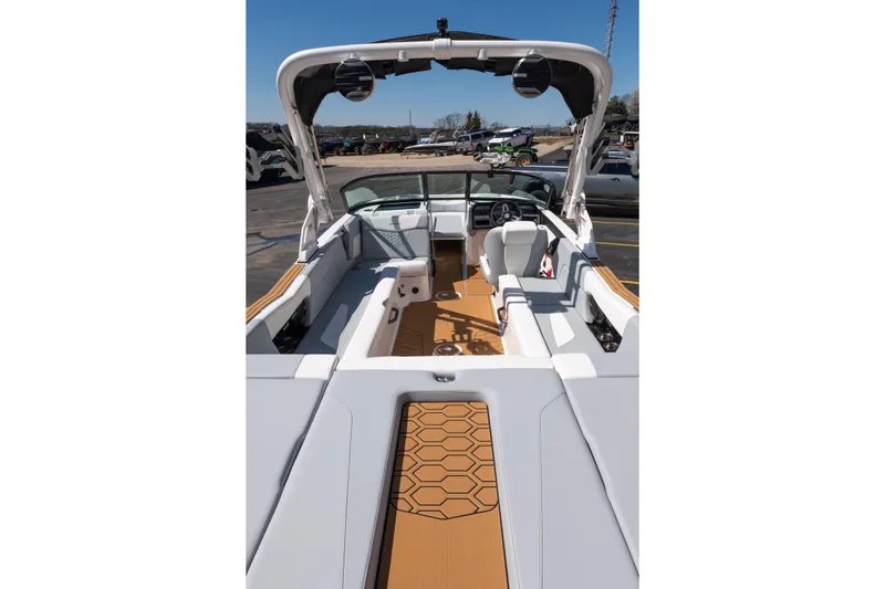 Slide: The Image of 2026 MasterCraft NXT24 boat interior with modern seating and sleek design. - 9