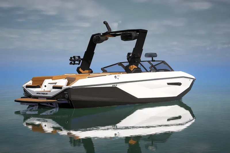 Slide: The Image of 2026 Nautique Super Air Nautique G23 boat on calm water, sleek design, modern features. - 2