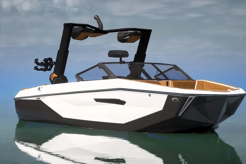 Slide: The Image of 2026 Nautique Super Air Nautique G23 boat on calm water, showcasing sleek design and modern features. - 4