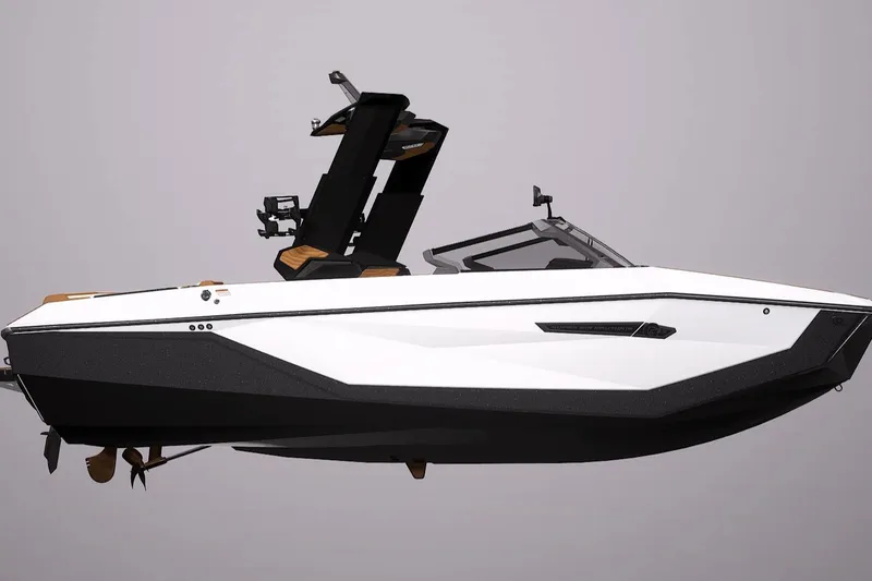 Slide: The Image of 2026 Nautique Super Air Nautique G23 boat, sleek design, side view, black and white color scheme. - 5