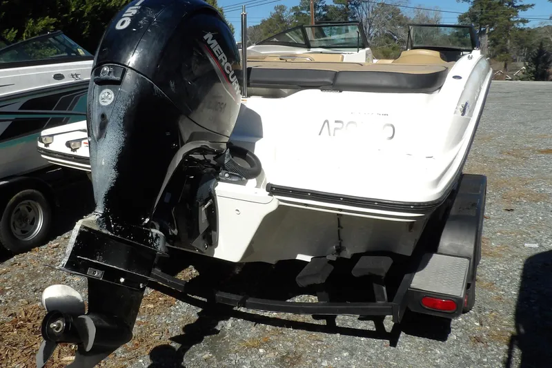 Slide: The Image of 2023 Searay 210 SPO boat with Mercury outboard engine on trailer. - 10