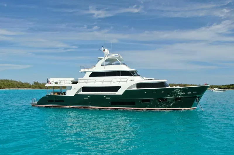 The Image of 2024 Marlow 90 V yacht on turquoise water under a clear sky. - 1