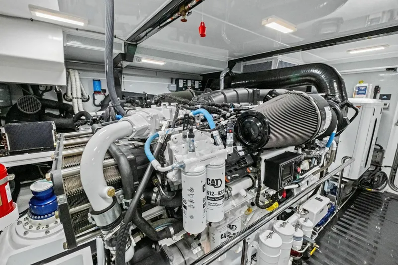 Slide: The Image of Engine room of 2024 Marlow 90 V yacht, showcasing advanced machinery and components. - 100